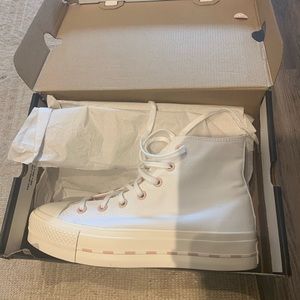 White and rosegold convers hi lift platform sneakers. Brand new. In box.
